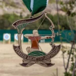 Medaglia personalizzata con l'iscrizione "Peakeen Archery Championship" per il riconoscimento delle gare di tiro con l'arco.