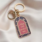 Porte-clés comportant la phrase " allah Protect You ", symbolisant la foi et la protection en Allah.