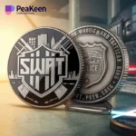 SWAT challenge coin featuring a badge and shield, symbolizing law enforcement and teamwork in a compact design.