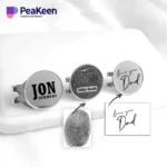 Individuelle Manschettenknöpfe mit einem Fingerabdruck sowie "Jon" und "Dad" und einem dazugehörigen Clip für den Hutballmarker