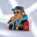 A pin depicting a rapper in sunglasses and headphones, representing hip hop culture and style.